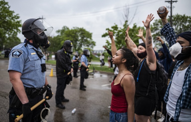 Protestors having a standoff with the police